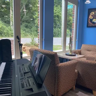 Entrance with working piano.
