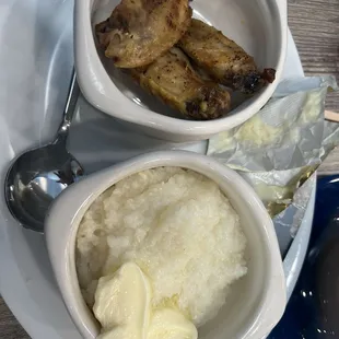 Grits and chicken wings.