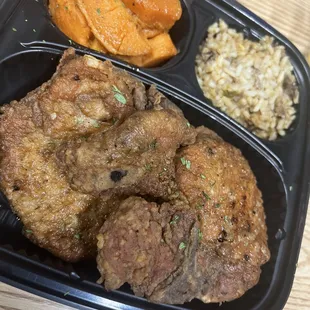 a meal of meat, rice and carrots