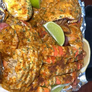 a tray of fish and vegetables