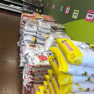 stacks of bags of flour on display