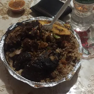 Jerk chicken and peas and a few pieces of cha chi kai chicken. The food was great!!!!!!!