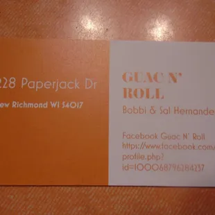 Business card with contact info.