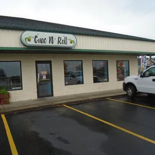 Front of the building, view looking southwest.