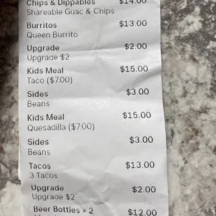 We just paid $18 (15+3) for each of our kids small meals (1taco+rice&amp;beans) that was listed as $8 on the menu.  Check your receipt