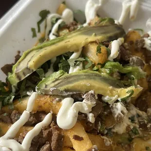 Asada fries with nacho cheese and Avocado?