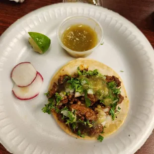 El pastor regular taco with salsa on the side