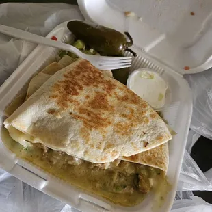 Chicken quesadilla, with extras. Very large portion and delicious!