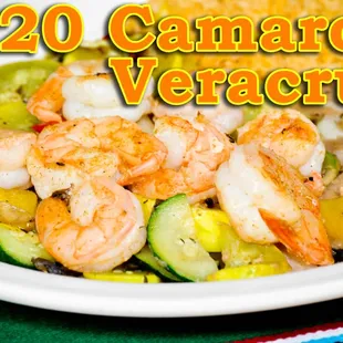 a plate of shrimp and vegetables