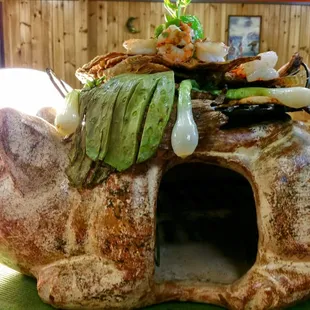 Experience the exiting tastes of chicken, carne asada, shrimps and whole deep fried tilapia.   Served with onions, rice, beans and frijoles