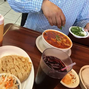 Menudo y Pupusa revuelta and of course their refreshing agua de Jamaica.