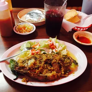 Mojarra al mojo de ajo is delish!  Agua de Jamaica is the best I&apos;ve ever had, made with the real hibiscus flower.
