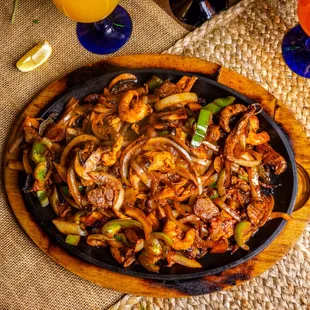 a plate of mexican food on a table