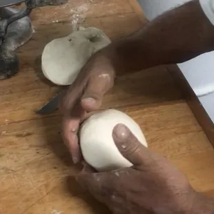 These are the hands of a baker who has dedicated more than half of his life to baking for the community!