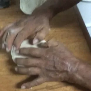 These are the hands of a baker that has dedicated more than half of his life baking and catering to his community!
