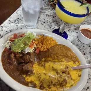 Texas plate. Carne guisada and 2 beef enchiladas. So yummy!