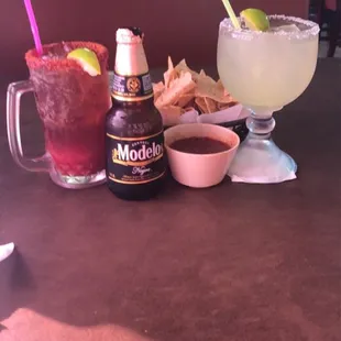 a table with drinks and snacks