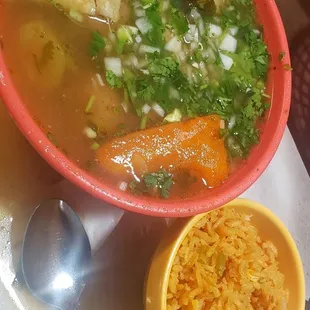 Chicken soup with added jalapeños cilantro and onions