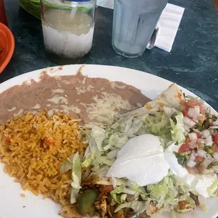a plate of mexican food on a table