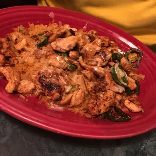 a plate of chicken and rice