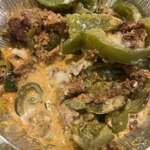 Barely filled Chori Queso with majority of peppers