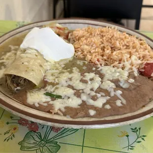 Shredded beef enchilada with green sauce