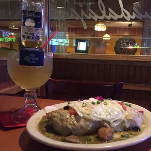 Corona Rita parred with our Popular Chile Verde Burrito with a Fried Egg on top!