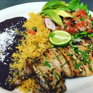 Tonight's feature: Cilantro Lime Chicken - Charbroiled chicken thigh. Served with black beans, rice, pico de gallo and avocado slices!