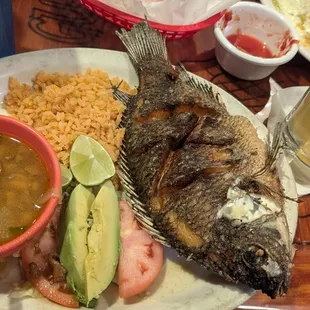 Mojarra Frita. Substituted fries for charro beans. Hornitos Black Margarita on the rocks.
