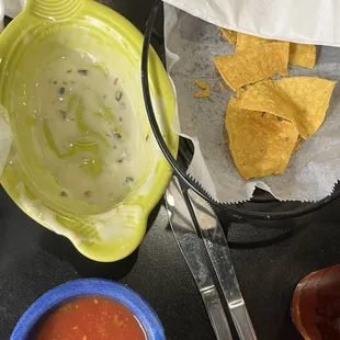 Empty bowl where queso sat, some salsa and chips!