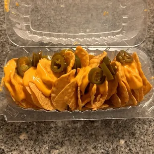 This place Ridiculous Overpriced.. $9.88 for this Nachos this super small. Never going back  again.