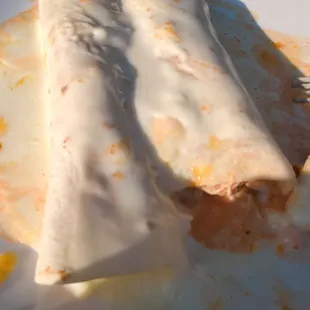 two burritos on a plate