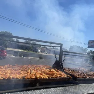 a grill full of food