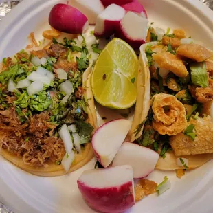 Tacos- carnitas (L) &amp; chicharron (R)