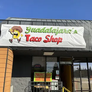 Working on our new sign.