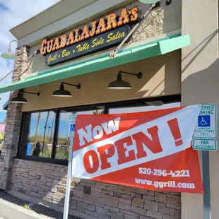 Exterior of the restaurant with contact info
