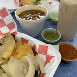 a basket of tortillas and a cup of coffee