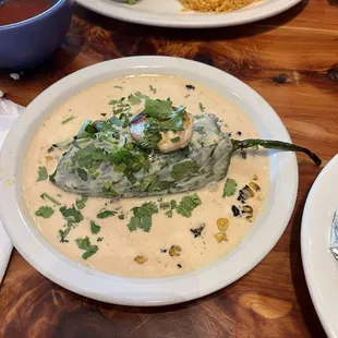 Poblano.... It's a shrimp and corn stuffed poblano pepper it is delicious!