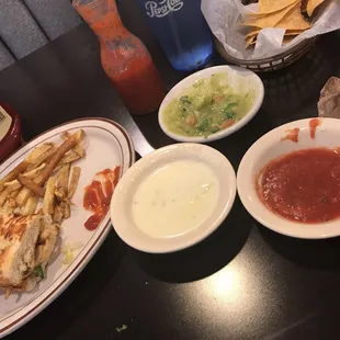 Chicken Torta (so buttery and yummy) and a few things from the salsa bar (included). BEST QUESO AROUND