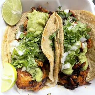 Pollo asado and pastor tacos. Both excellent!