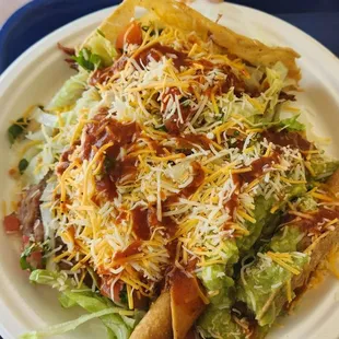 Big plate  includes 1 beef taco, 2 rolled tacos &amp; bean tostada