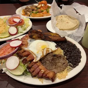 Montanero. Bistec Encebollado* / Steak*. Green Spicy salsa