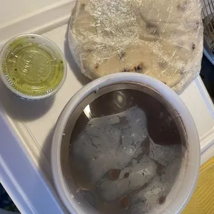 Pupusa? Black beans and a green sauce.