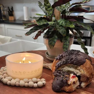 Chocolate covered croissants with raspberry filling