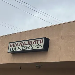 a sign on the side of a building