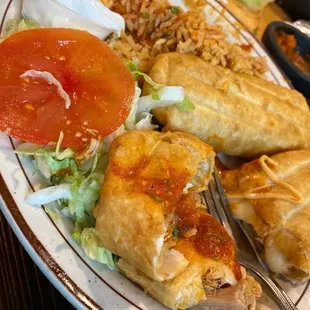 1-chicken chimichanga and one ground beef chimichanga with rice. YUM