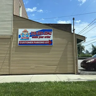 This is what you will see on the side of the building that has entrances on Detroit Ave and also from the parking lot in the back.