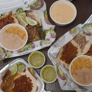 Chorizo, carnitas, al pastor tacos. Queso too!