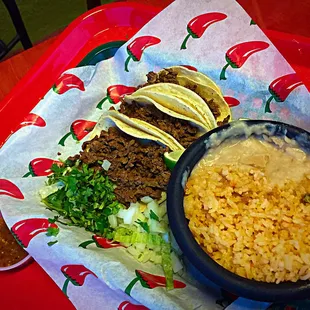 Beef fajita tacos with rice and beans