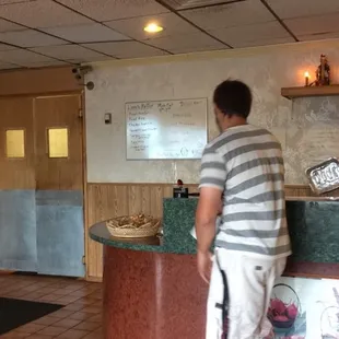 a man standing at the counter